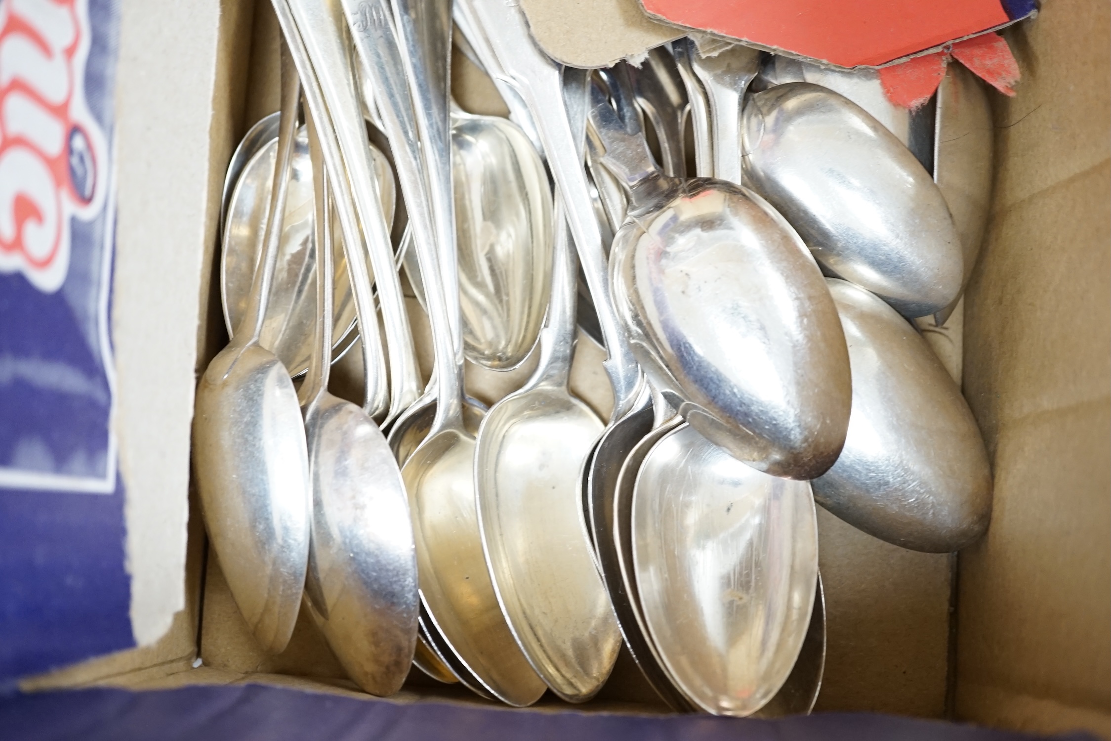 A harlequin collection of twenty mainly 19th century silver fiddle pattern dessert spoons, various dates and makers, together with fourteen similar Old English pattern dessert spoons, various dates and makers